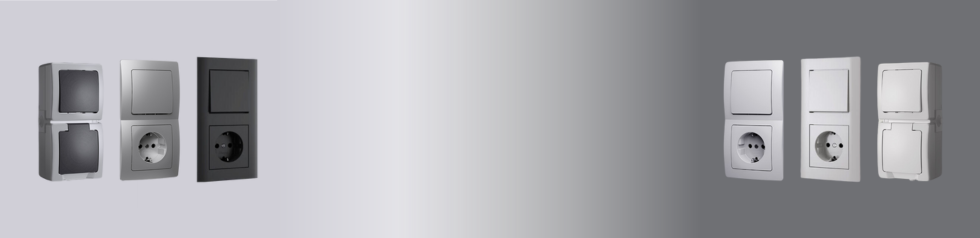 Verschiedene Designs von Steckdosen und Schaltern auf grauem Hintergrund